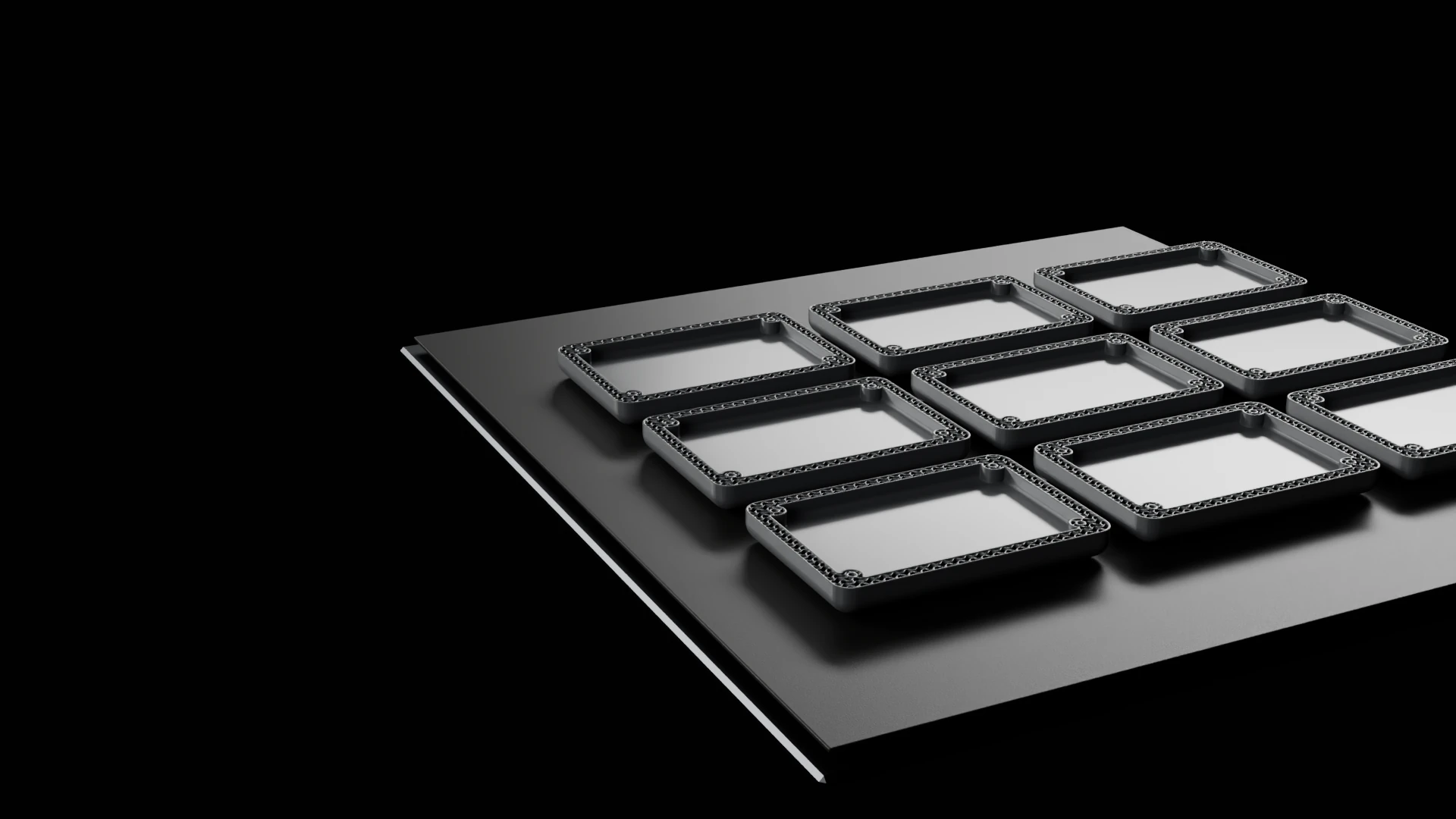 A build plate mid-print: nine electronics housings with gyroid infill in the walls